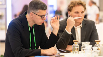 The Perfumer & Flavorist+ team sampling ingredients at the World Perfumery Congress in Monterey, California; from left: Jeb Gleason-Allured, group publisher, and Mitch Fox, brand development manager.