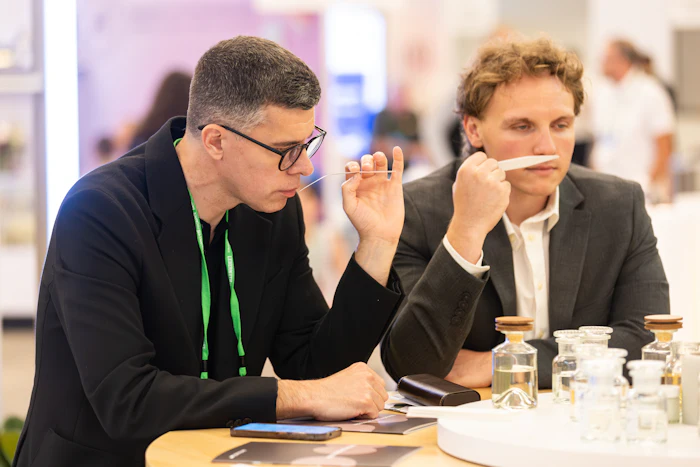 The Perfumer & Flavorist+ team sampling ingredients at the World Perfumery Congress in Monterey, California; from left: Jeb Gleason-Allured, group publisher, and Mitch Fox, brand development manager.