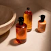 L'Occitane Verveine soap and lotion products displayed with ceramic bowl in natural sunlight