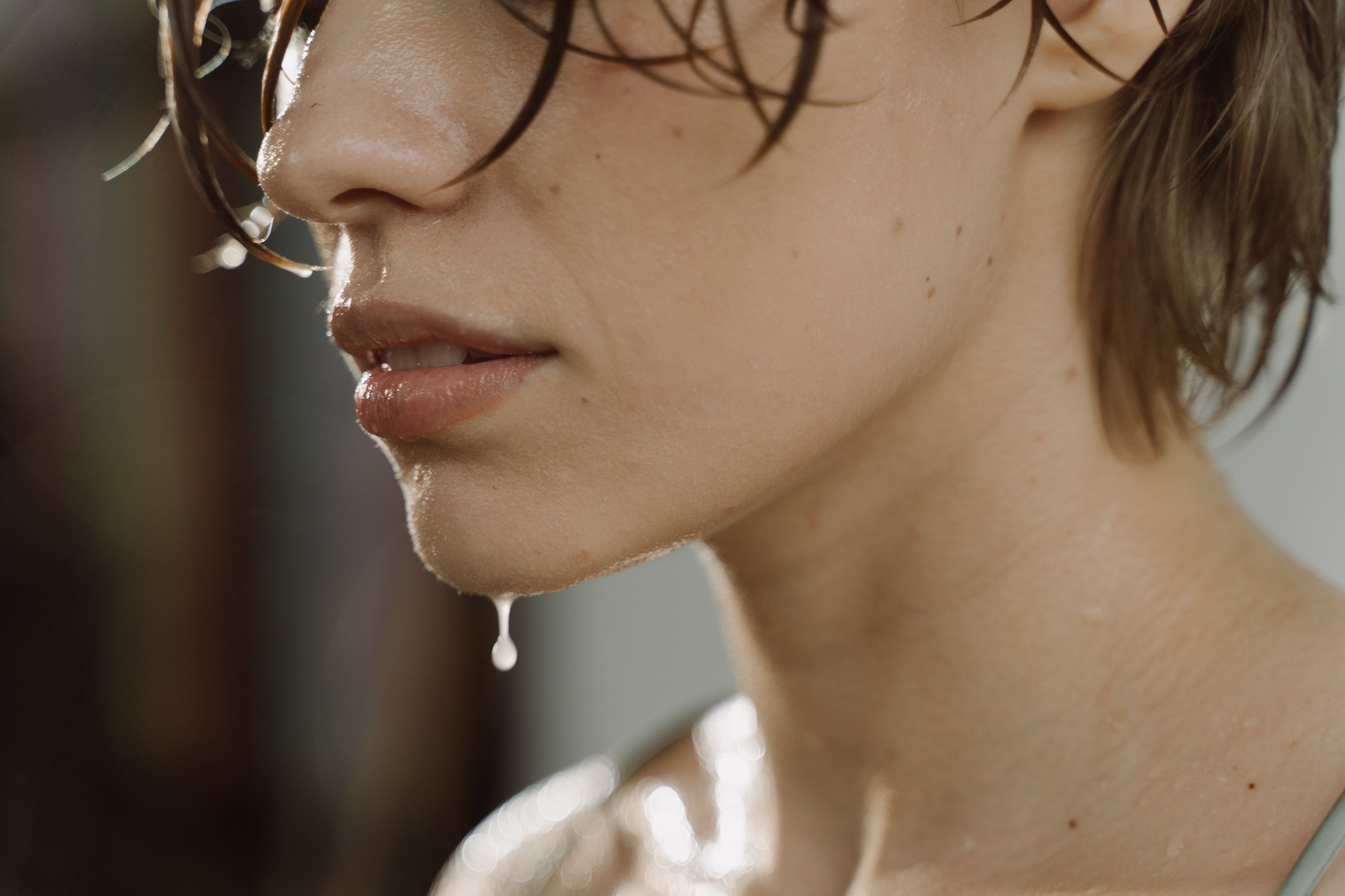 Fresh eccrine sweat is largely odorless. Characteristic axillary odor emerges when microorganisms on the skin metabolize precursors secreted by the body, generating volatile compounds with substantially different odor characteristics.