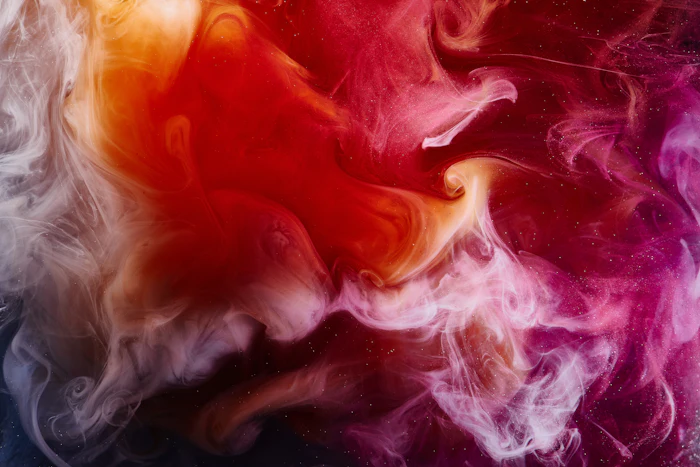 Abstract fluid art with swirling pink, red, orange, and purple smoke-like patterns creating a dynamic, colorful background