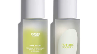 Two frosted glass bottles of Future Society Base Scent personal scent primer with white caps displayed against a white background